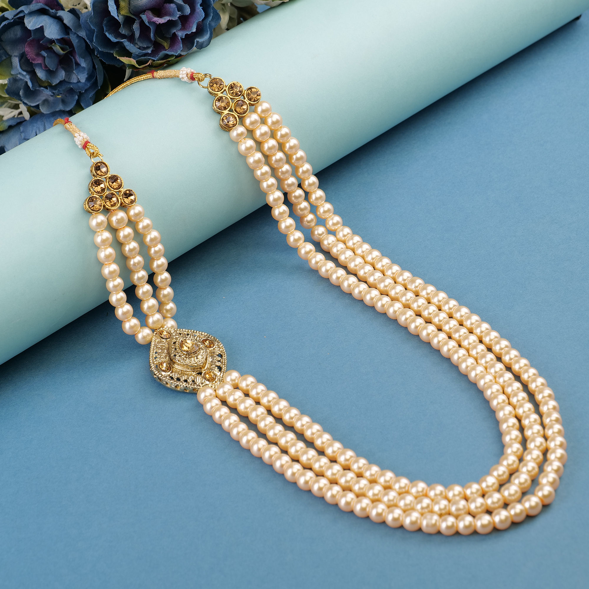 A groom's sherwani mala, also known as a groom's garland, holds significant cultural