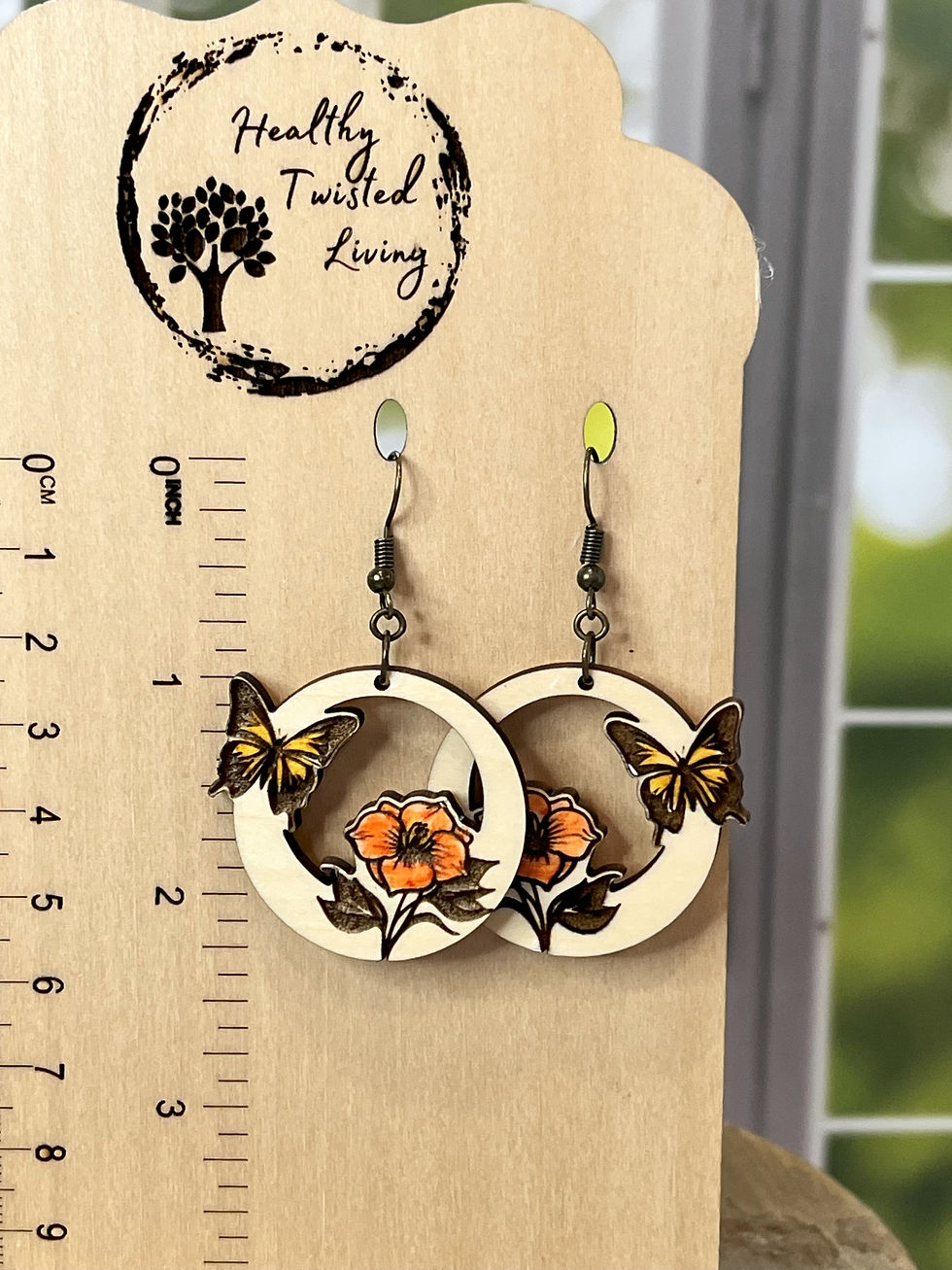 Thumbnail: Butterfly floral round wood dangles