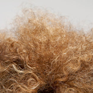 THE RIGHT WAY TO KEEP FRIZZ AWAY