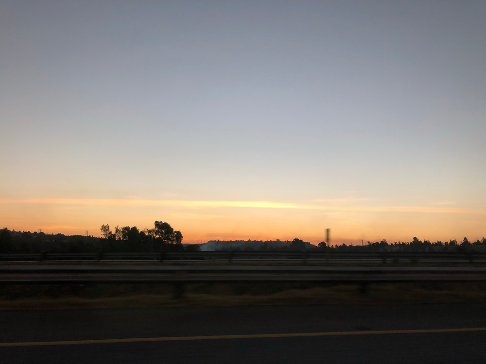 My last South African sunset for a while, driving to O.R Tambo AIrport