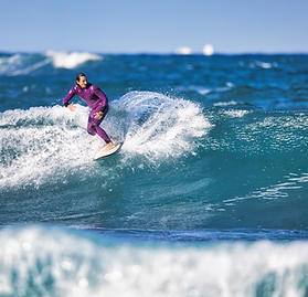 surf coach valerio doing a snap at marleys on the east coast of malta with malta surf school