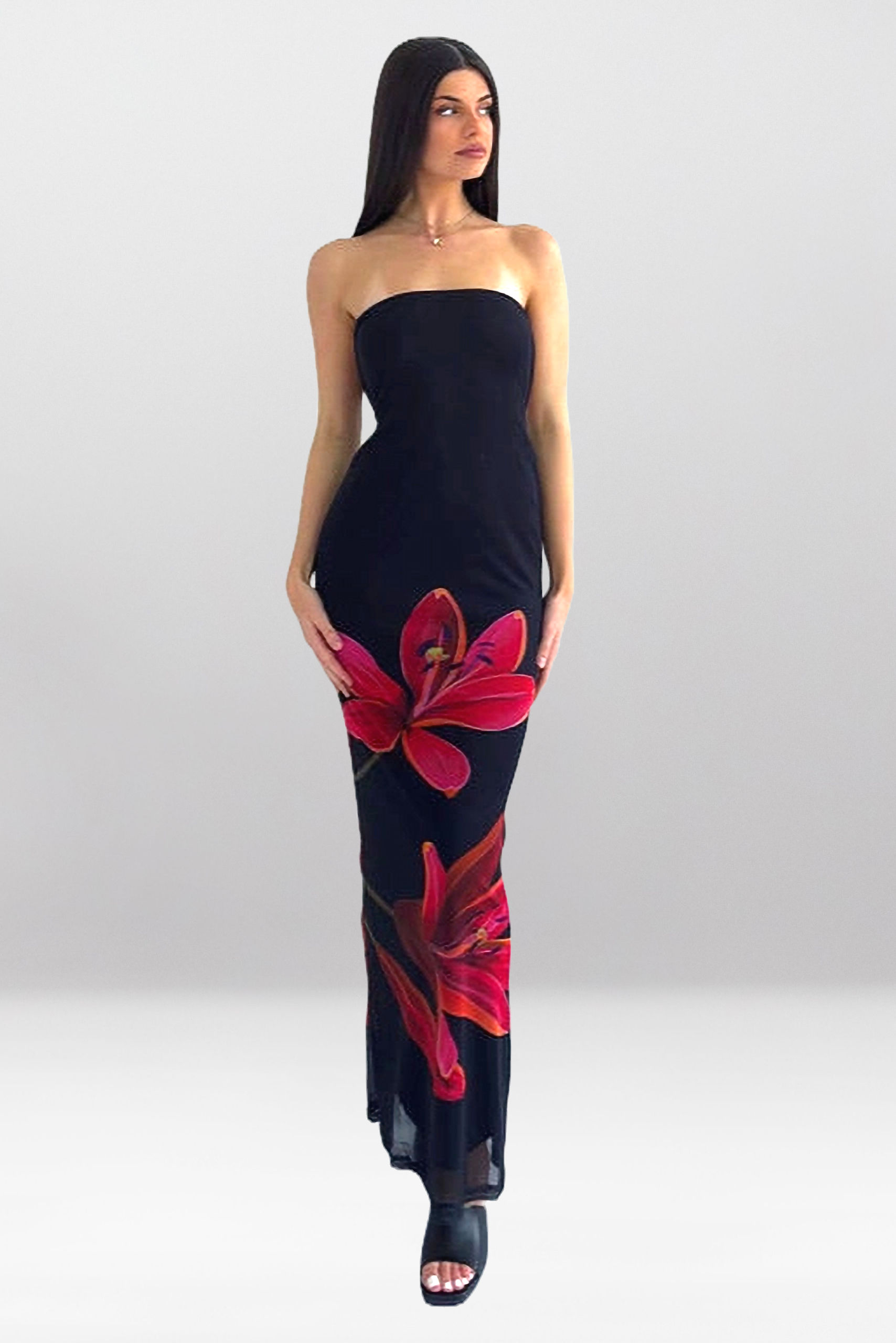 Sienna Floral Maxi Dress – A stunning flowy maxi dress with a delicate floral print, perfect for garden parties and vacations