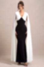 Robin Plunge Neck Maxi Dress – a stunning, floor-length dress with a deep neckline, perfect for evening events.
