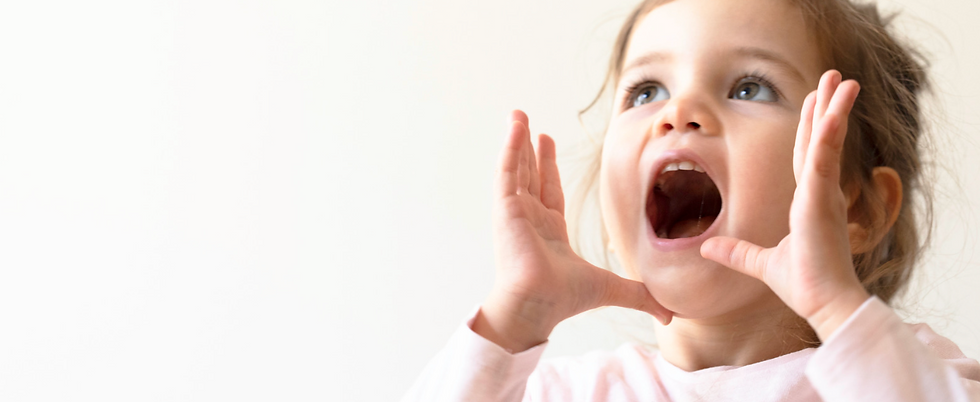 Energetic toddler girl showing signs of overtiredness before bed.