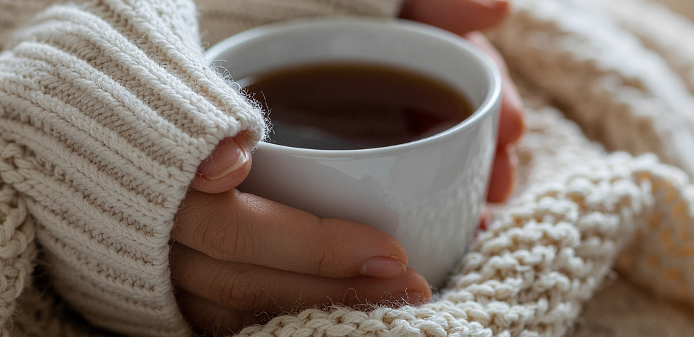 overwhelmed mother holding a warm cup of tea or coffee as reminder to look after yourself