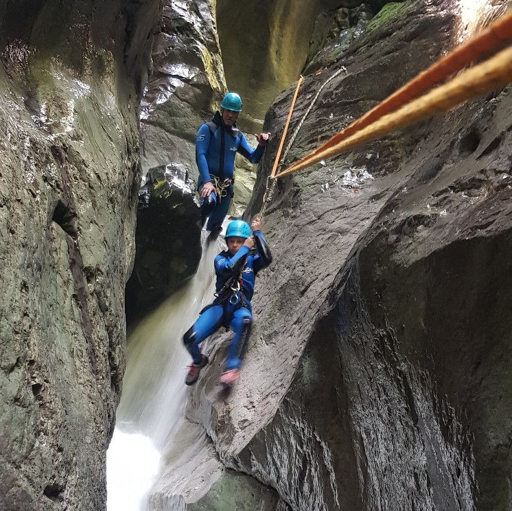 high angle view of a waterfall cascading into a rocky pool