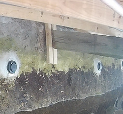 Concrete Seawall with one-way filter check valve as weep holes