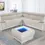 Thumbnail: Light beige L-shaped sectional sofa with matching coffee table, blue illuminated center.