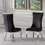 Thumbnail: Two elegant black velvet dining chairs with polished silver cabriole legs.
