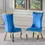 Thumbnail: Two elegant blue velvet dining chairs with gold legs.