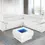 Thumbnail: Contemporary white sectional sofa and illuminated coffee table in a modern room.