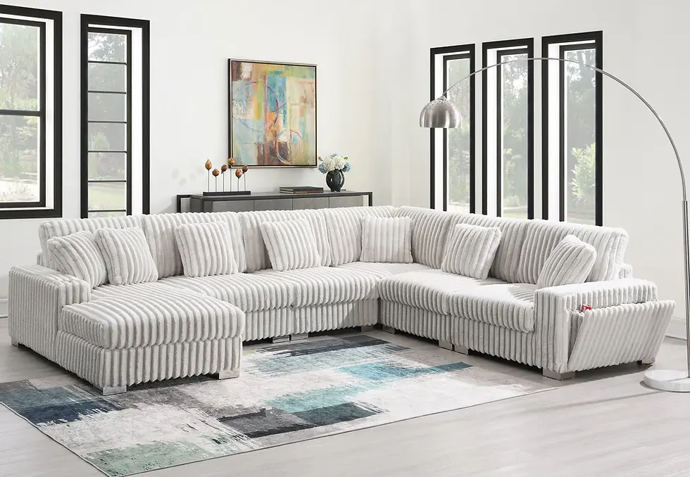 Thumbnail: Light grey U-shaped sectional sofa in modern living room with patterned rug.