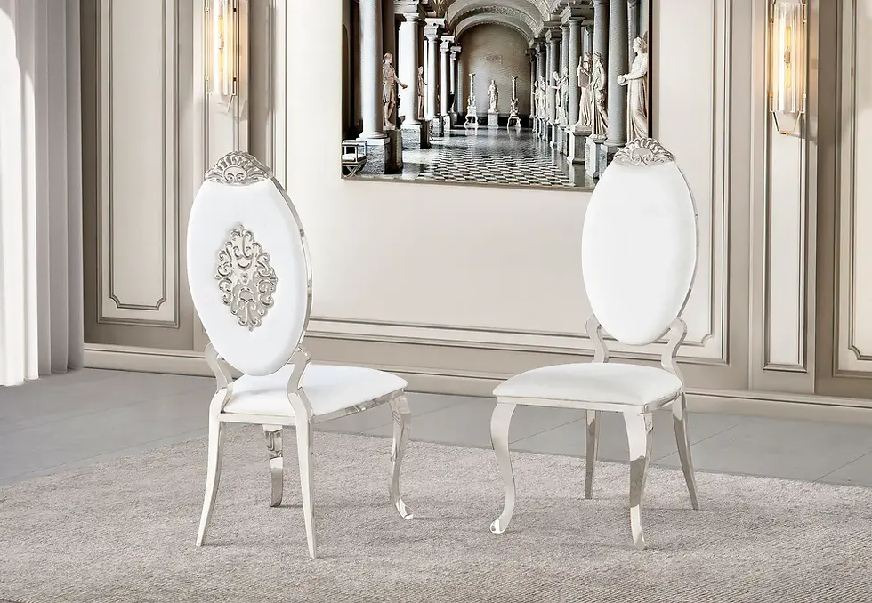 Thumbnail: Two elegant white chairs with silver ornate details in luxurious room.