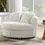 Thumbnail: Round white swivel accent chair with ribbed texture, modern living room.