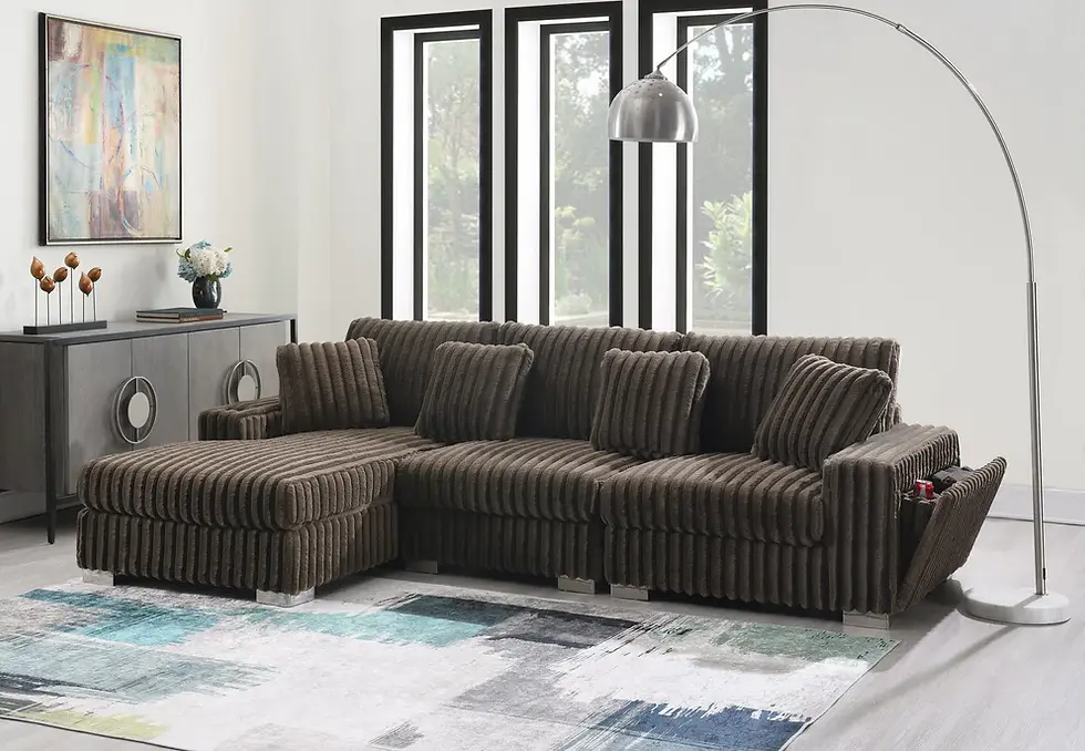 Dark brown sectional sofa with chaise lounge in modern living room.