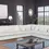 Thumbnail: White sectional sofa in a modern living room with large windows