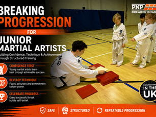 Young martial artists learning board breaking progression with a Taekwondo instructor using PNP Breaker Boards to build confidence, technique and skill development.