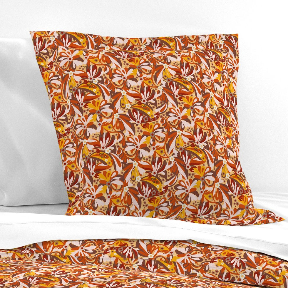 pillows and sheets in the oranges and browns of the retro swirls pattern