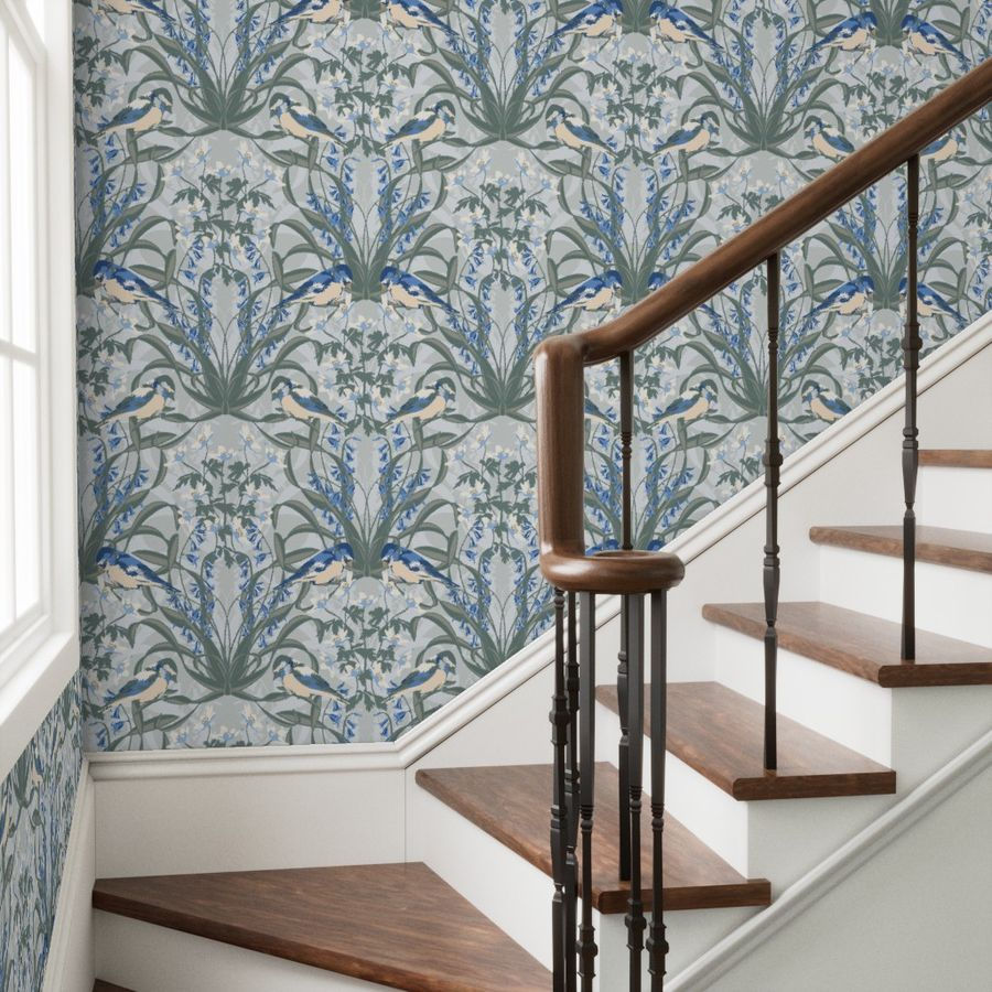 wallpaper behind a stair case with bluebells and little birds