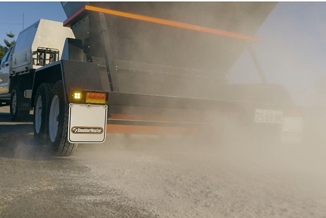 Road binder stabilisation spreader trailer for road construction
