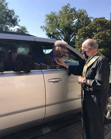 Fr Mike Blessing of Dog.jpg