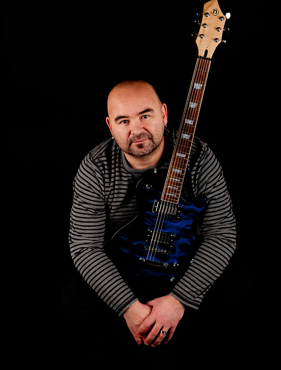 Norm Jolin with his Blue Thunder Guitar