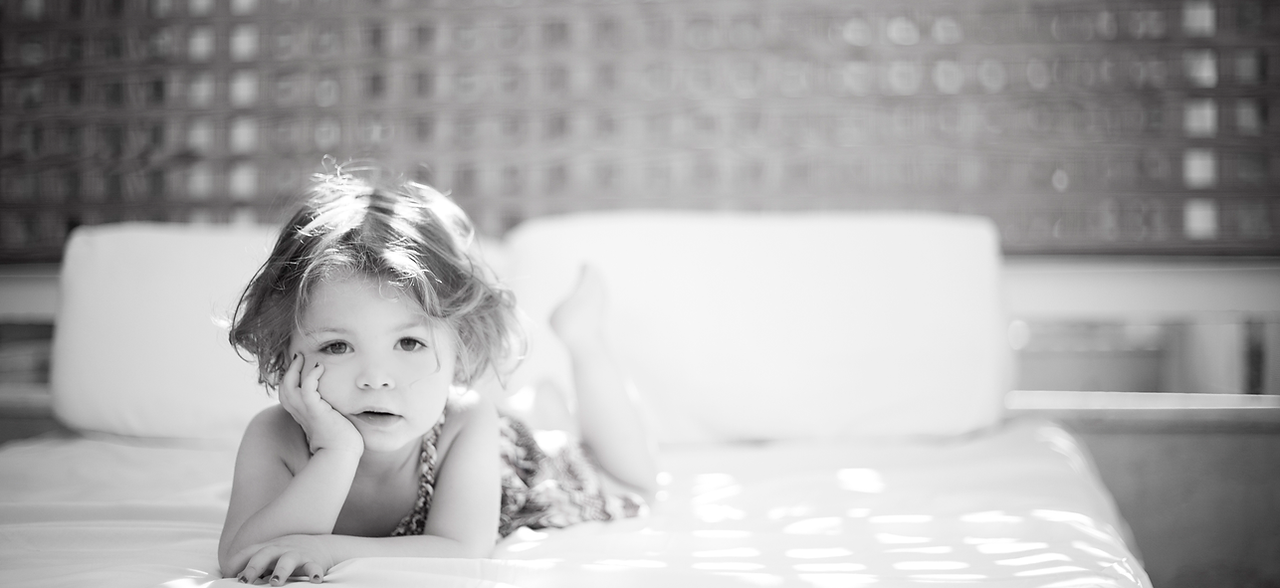 Child on the Bed