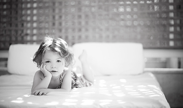 Child on the Bed