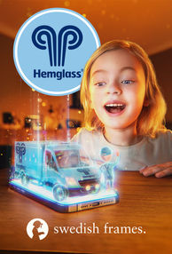 A little girl looks at an ice cream truck. 
