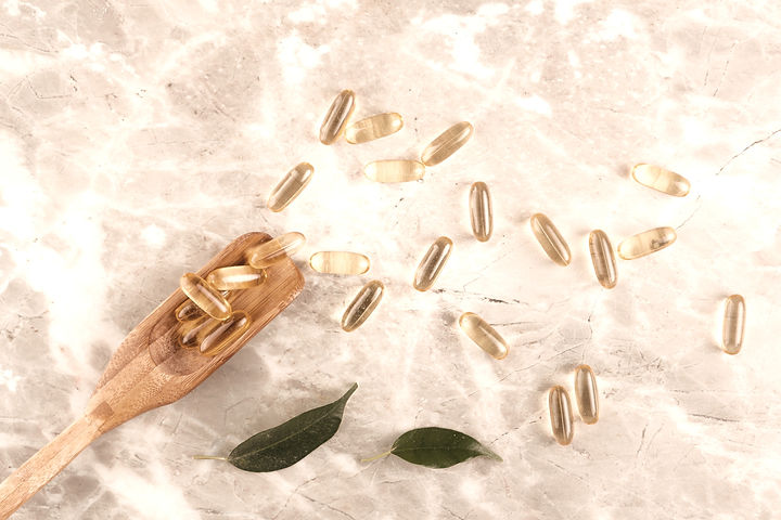 flat-lay-arrangement-with-pills-on-marble-table_edited.jpg
