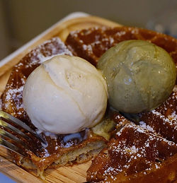 gelato with two scoop, oolong peach and pistachio with crispy waffles