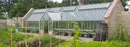 Green house with walled garden.jfif