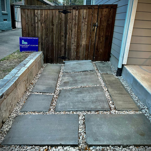 Concrete pavers set in gravel leading to a wood gate – Good Deal Builder, Dallas TX
