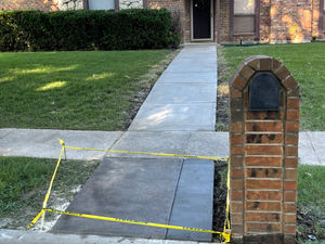 Leaning brick mailbox by a sidewalk before leveling – Good Deal Builder, Dallas TX