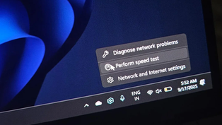 Windows 11 Internet Speed Test AMIGOdded to Taskbar in March 2026 Update