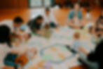 Baby development class in action with parents and babies