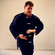 Ron Melchet expert instructor teaching Tai Chi next to Givaataim