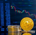 closeup-golden-bitcoins-dark-reflective-surface-histogram-decreasing-crypto.jpg