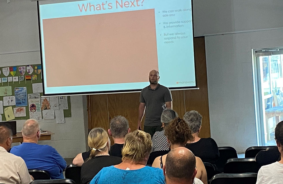Simon presents at a Manawanui Meets community meeting