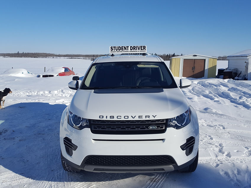 Land Rover Discovery picture with student driver on top.jpg