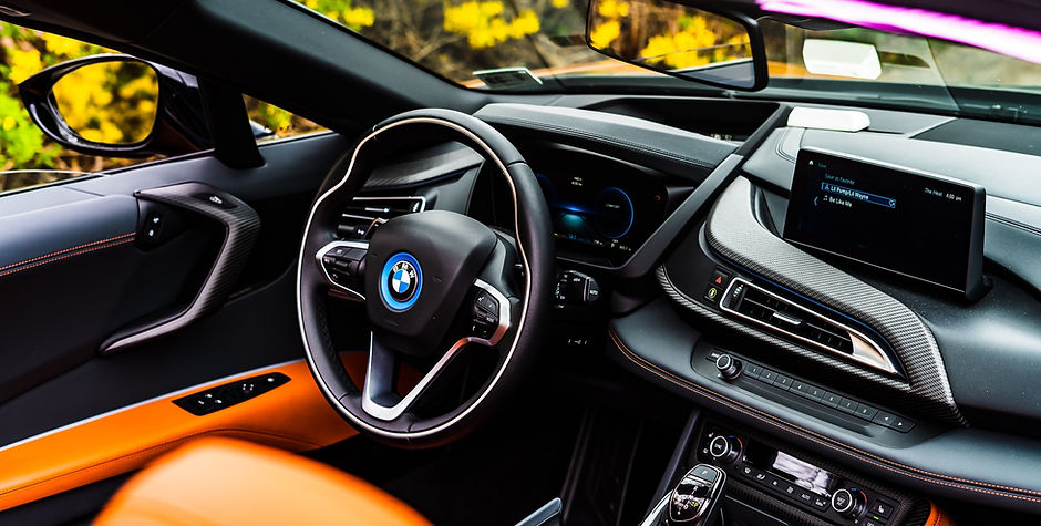 black-and-orange-car-interior-3972753.jp