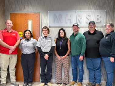 Tammie Colon with ODOT and Vantage Career Center under MHRSB sign