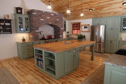 Traditional Green Kitchen with brick hood