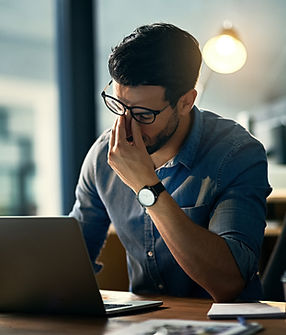 Man Stressing at Desk