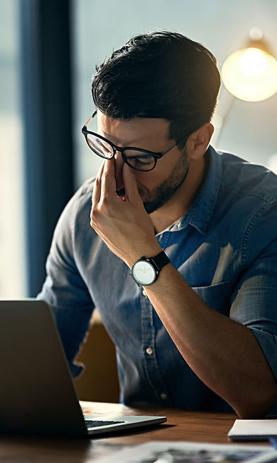 Man Stressing at Desk