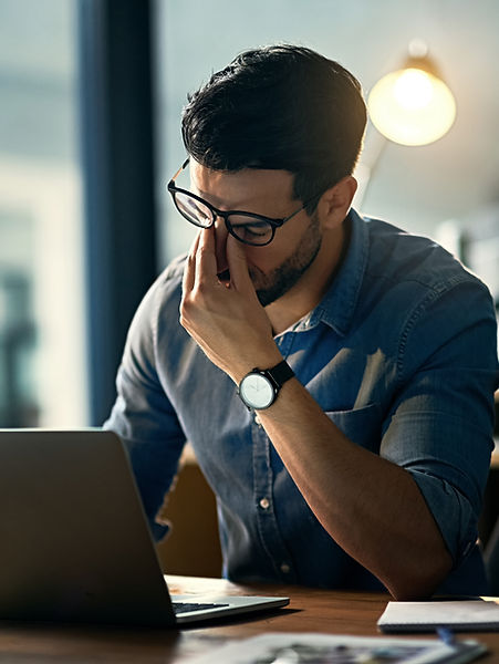 Man Stressing at Desk