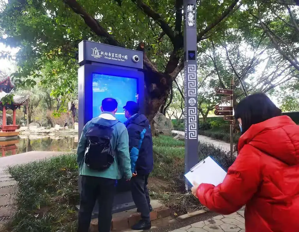 A professional technician performing a routine inspection as part of a comprehensive outdoor digital signage maintenance plan to ensure hardware longevity and weather resistance.