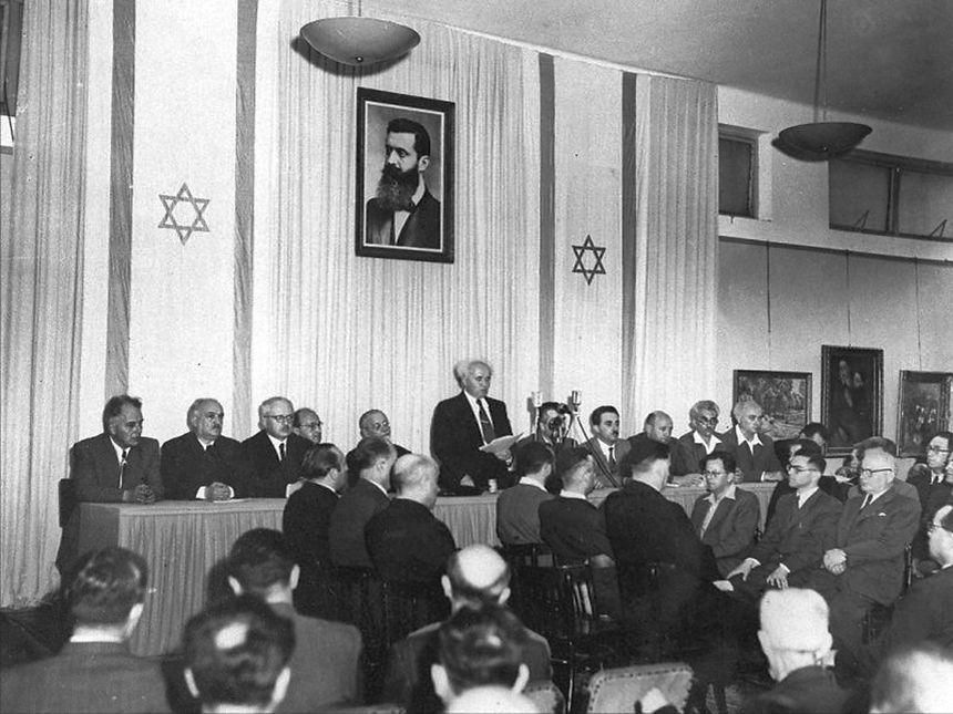 david_ben-gurion_reading_the_declaration_of_independ_of_the_state_of_israel_in_tel_aviv.jp
