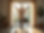Eye-level view of a woman performing a balance exercise in her living room