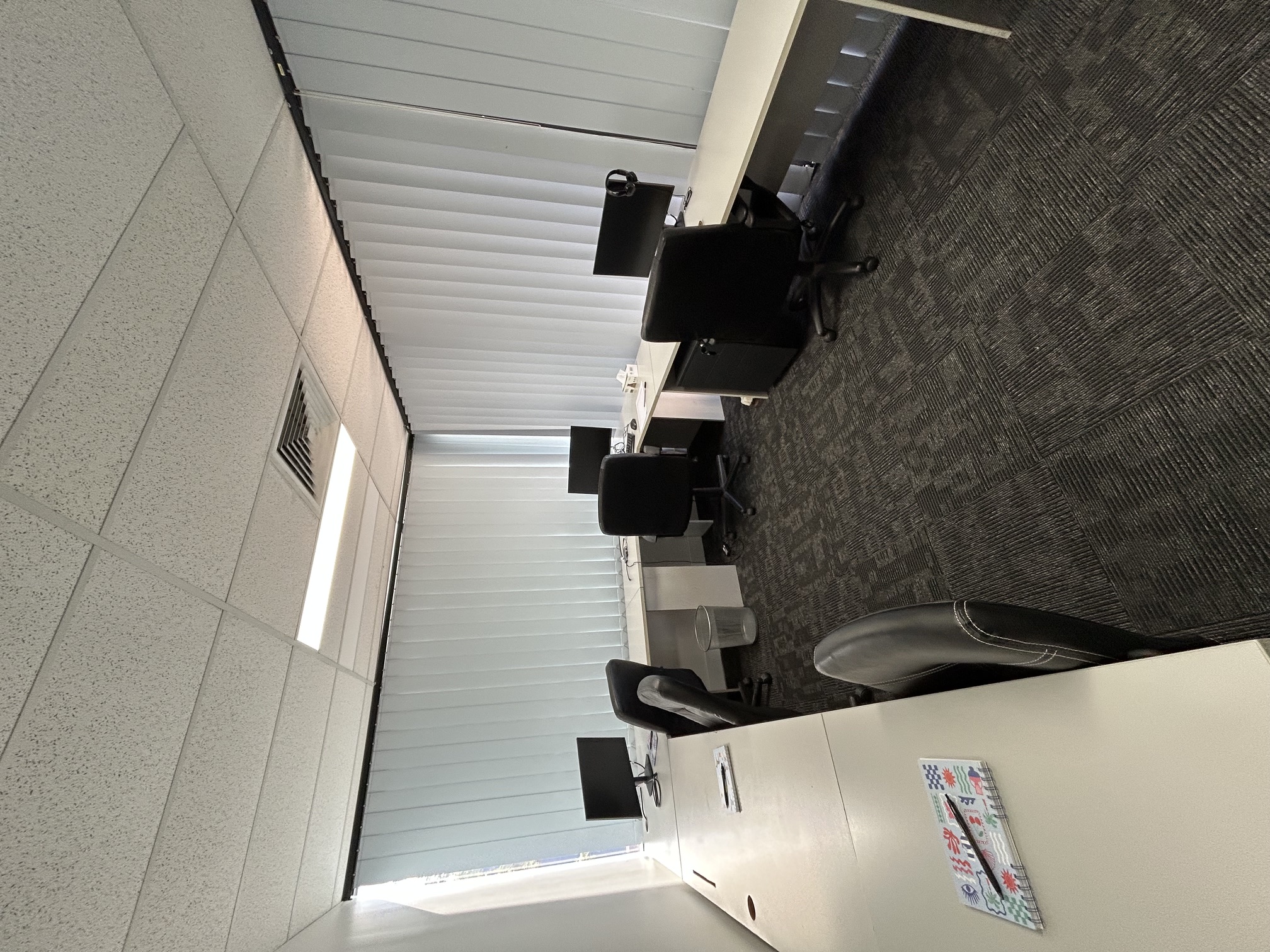 Row of host desks in a reception area